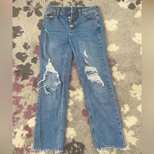ripped jeans with silver buttons. 98% cotton very comfortable with open cut leg